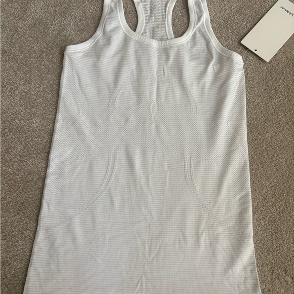 lululemon athletica Tops - Lululemon Swiftly Tech Racerback white
Size 4
White
NWT